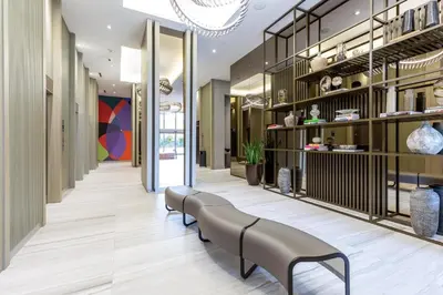 a lobby of a store with a row of benches at Ocean Breeze Retreat - Pool Gym Access Views in Hallandale Beach