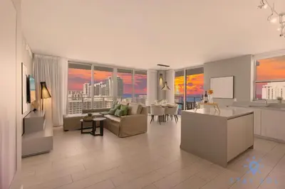a large living room with a view of a city at Wrap Around Balcony - Paradise Beach - Amazing Pools in Hollywood