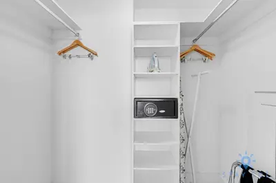 a bathroom with white walls and white shelving at Wrap Around Balcony - Paradise Beach - Amazing Pools in Hollywood