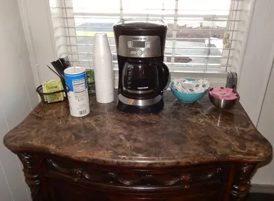 a coffee maker sitting on top of a table at Haven Hotel - Fort Lauderdale Airport & Cruise Port in Fort Lauderdale