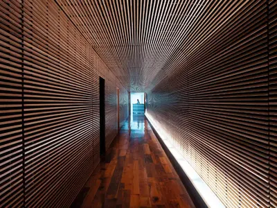 a hallway with a light at the end of a tunnel at The Standard Spa, Miami Beach in Miami Beach