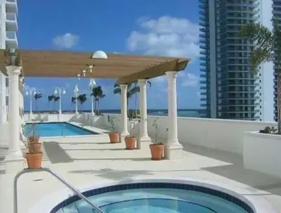 a swimming pool on the roof of a building at Star Stay Miami Yellow Brickell in Miami