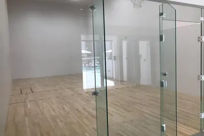 a glass elevator in a room with a wooden floor at Hollywood Beach luxury condo-HBH in Hollywood