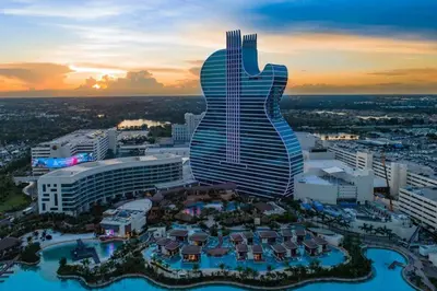 a city with a guitar shaped building with a city at Lakeside Vacation Home in Davie