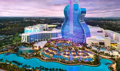 a rendering of a resort with a large building at Family, Couples Retreat near Airport, Cruise Port & Beaches in Fort Lauderdale