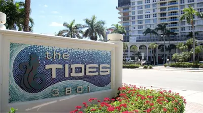 a sign for the tides in front of a building at THE TIDES on MIAMI HOLLYWOOD in Hollywood