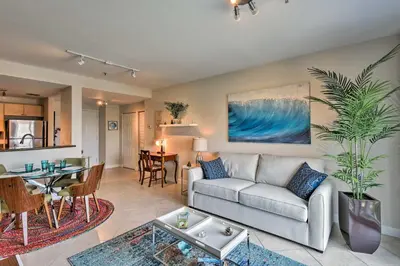 a living room with a couch and a table at Miami Apartment by Coral Gables - Great Location! in Miami