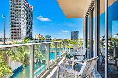a balcony with chairs and a view of the city at Luxury Amenities, Infinity Pool, Gym, Hot Tub in Hollywood