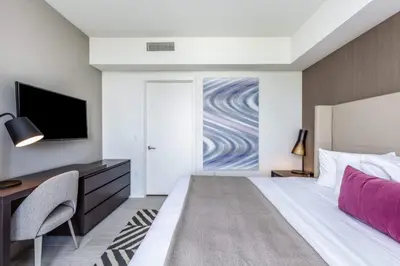 a hotel room with a large bed and a tv at Hyde Beach House Luxury Condo-Resort 1204 condo in Hollywood Beach