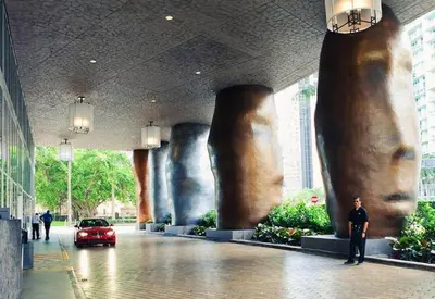 a man standing in a lobby of a building at ICON BRICKELL-29th FLOOR OCEAN VIEWS-FREE SPA in Miami
