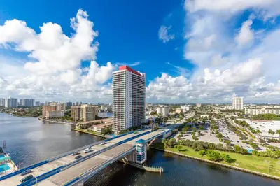 a view of a city with a bridge and a river at Family 3 bedroom Hyde Beach House Miami 22th floor in Hallandale Beach