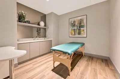a room with a bench in a kitchen at Provident Grand Luxury Short-Term Residences in Miami