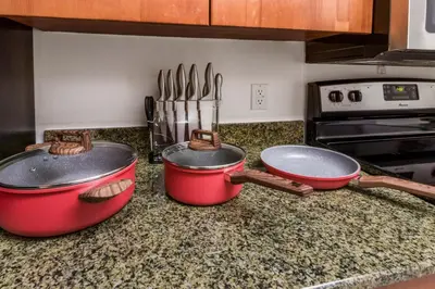 two pots and pans sitting on a kitchen counter at Miami Downtown Brickell spacious 4 Bedrooms 6 Beds in Miami