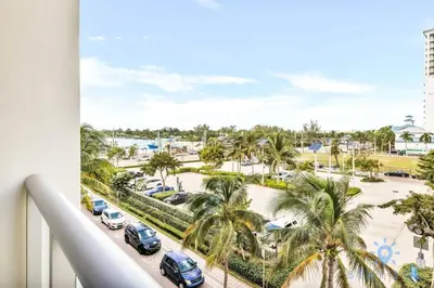 a balcony with a view of a parking lot at Costa Hollywood - Worth Traveling - Rooftop Pool- Gym in Hollywood