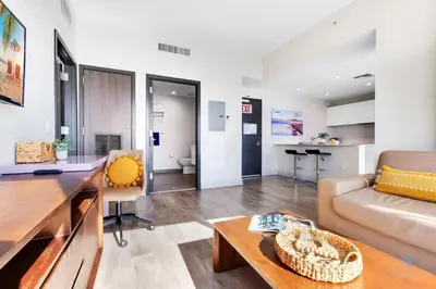 a living room with a couch and a table at Bay View - Balcony - Amazing Pool - Hollywood Beach in Hollywood