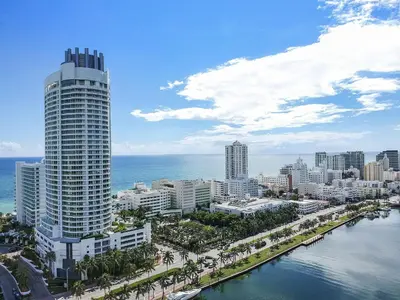 a city with a tall building next to the ocean at Studio at Sorrento Residences- FontaineBleau Miami Beach home in Miami Beach
