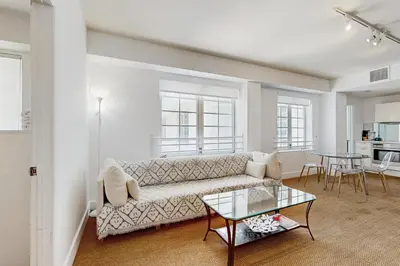 a living room with a couch and a table at The Carlyle 3G in Miami Beach