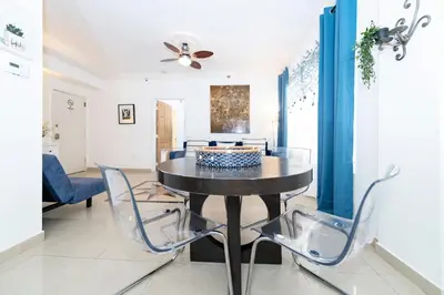 a dining room with a table and chairs at Apartments on Ocean Drive in Miami Beach