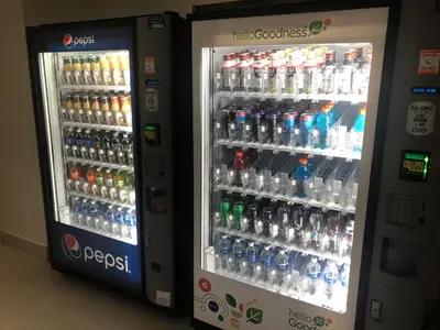 two vending machines filled with bottles of water at The Blue Island in Miami Beach