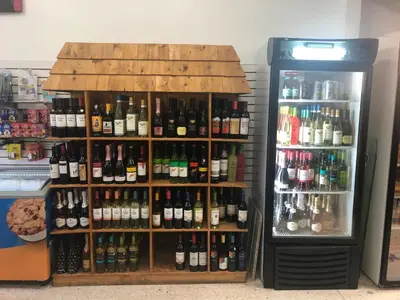 a large amount of bottles of wine in a store at The Blue Island in Miami Beach