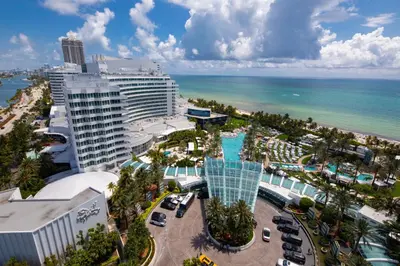 an aerial view of a resort and the ocean at FB Miami Beach Tresor Private Luxury Suites in Miami Beach