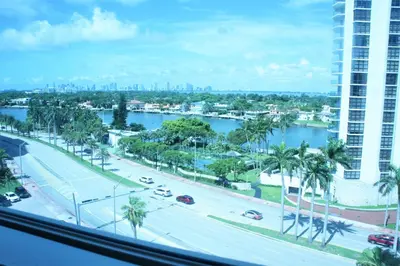 a view from a window of a street and a river at Castle 705 in Miami Beach