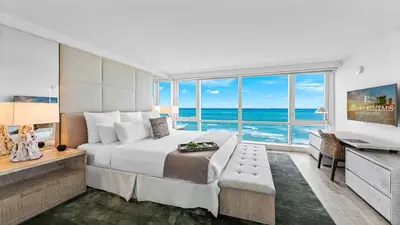 a bedroom with a bed and a view of the ocean at Oceanview Private Condo at 1 Hotel & Homes -1120 in Miami Beach