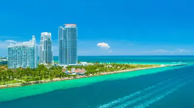 an aerial view of a beach with buildings and the ocean at Oceanview Private Condo at 1 Hotel & Homes -1120 in Miami Beach