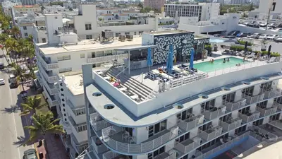 an aerial view of a building with a swimming pool at Deluxe apartments at the Congress in Miami Beach