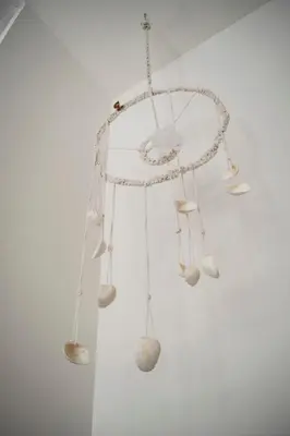 a group of white objects hanging from a ceiling at Stay Near Miami's Cultural Heart With Wifi in Miami