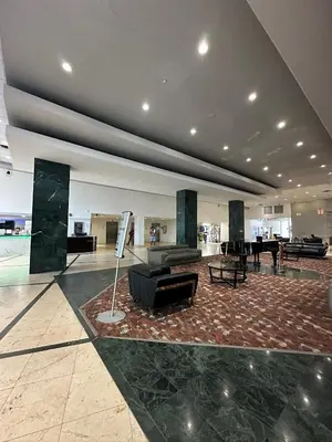 a lobby with a couch and a table in a building at Casablanca on the beach in Miami Beach
