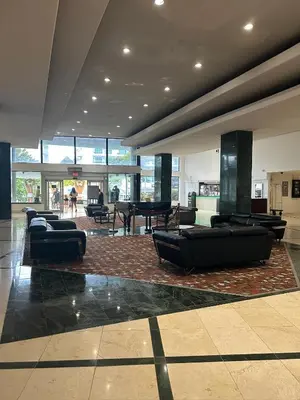a lobby with couches and a table in a building at Casablanca on the beach in Miami Beach