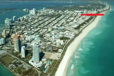 an aerial view of a beach with a red rectangle at SOBE SUNSHINE ONE BEDROOM APARTMENTs in Miami Beach