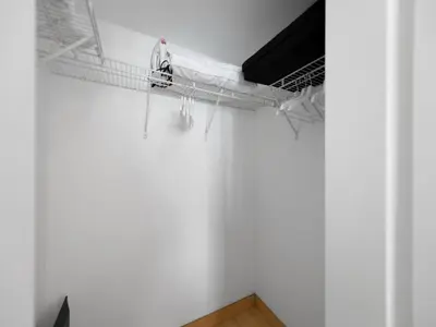 a man is on a rack in a room at Cozy and Bohemian Studio in Brickell in Miami