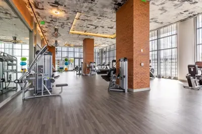 a gym with treadmills and cardio equipment in a room at Hyde Beach House Luxury Condo-Resort condo in Hollywood Beach