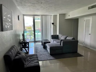 a living room with two couches and a couch at Spacious 1BR on the Beach, The Tides, Hollywood,FL in Hollywood