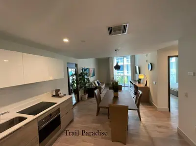 a kitchen and living room with a table and chairs at COSTA HOLLYWOOD Steps to Beach in Hollywood