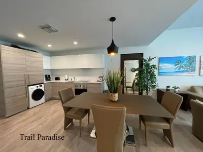 a kitchen and dining room with a table and chairs at COSTA HOLLYWOOD Steps to Beach in Hollywood