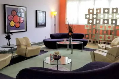 a living room with couches and chairs and tables at *530 BEACH PAD-OCEAN DRIVE* in Miami Beach
