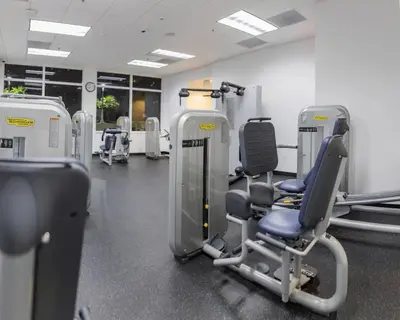 a gym with chairs and machines in a room at Luxury 1 Bedroom Apartment • Brickell • Unique Views in Miami