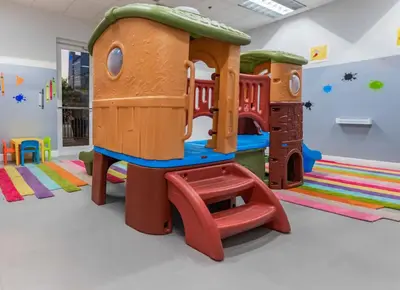 a childrens play room with a play structure at Luxury 1 Bedroom Apartment • Brickell • Unique Views in Miami