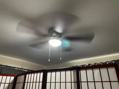 a ceiling fan with a light on a ceiling at Private Cubicle - Single Bed - Mixed Shared Dorm - MIAMI AIRPORT in Miami