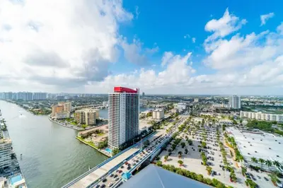 an aerial view of a city with a river and buildings at Hyde Beach House Luxury Condo-Resort condo in Hollywood Beach