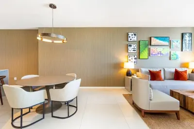 a living room with a bed and a table and chairs at HYDEOV1BR - Unit 1910 - Ammos condo in Hollywood Beach