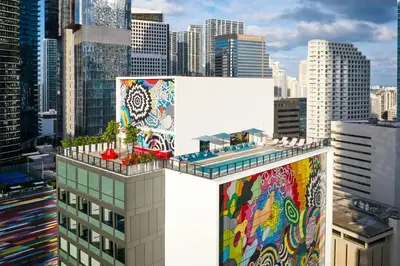 a building with a mural on the side of it at citizenM Miami Brickell in Miami