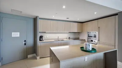 a kitchen with a counter with a plate on it at 2 bed rental on the beach15th floor Hollywood Miami in Hallandale Beach