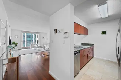 an empty kitchen and living room in a apartment at Private Unit Miami With Amenities And Parking in Miami