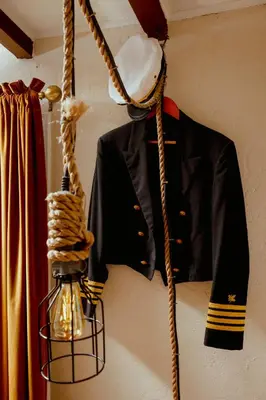 a jacket and a hat hanging on a wall at The Captain's Landing - 4 bedroom - 2 bathroom - Outdoor soaking tub - Adventure home in Fort Lauderdale