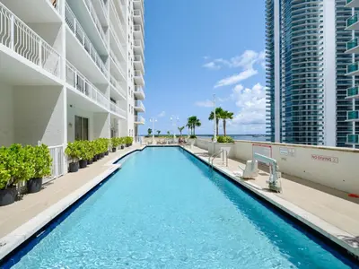 a swimming pool in the middle of a building at Spectacular apartment in Heart of Brickell in Miami