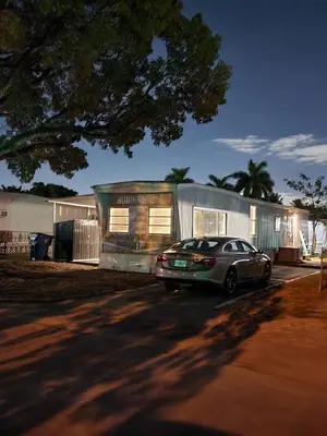 a car parked in front of a house at 1161 Studio 3 Miami in Miami
